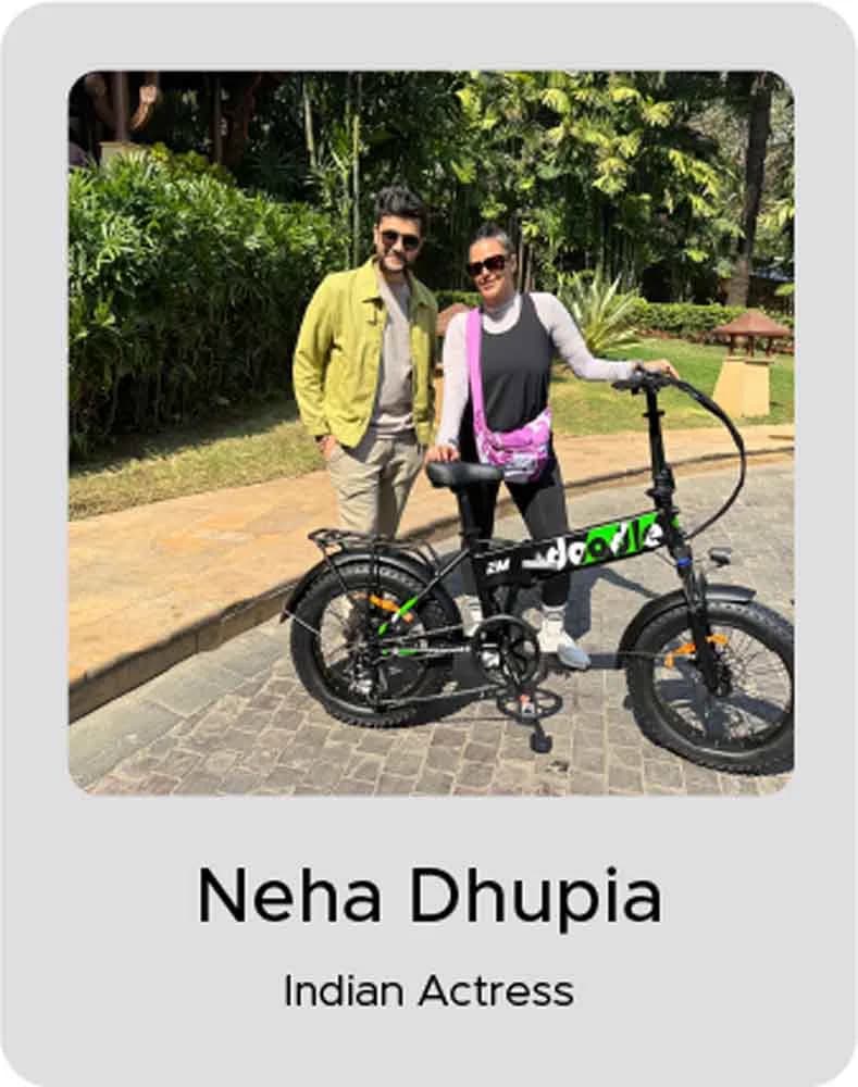Neha Dhupia, Indian Actress, with an EMotorad electric cycle