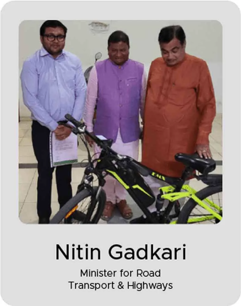 Nitin Gadkari, Minister for Road Transport & Highways, with an EMotorad electric cycle