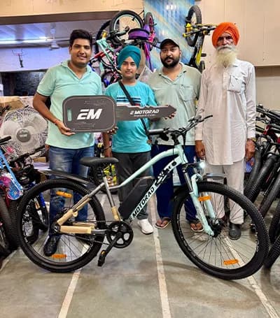 Sukhveer Singh with his EMotorad electric cycle